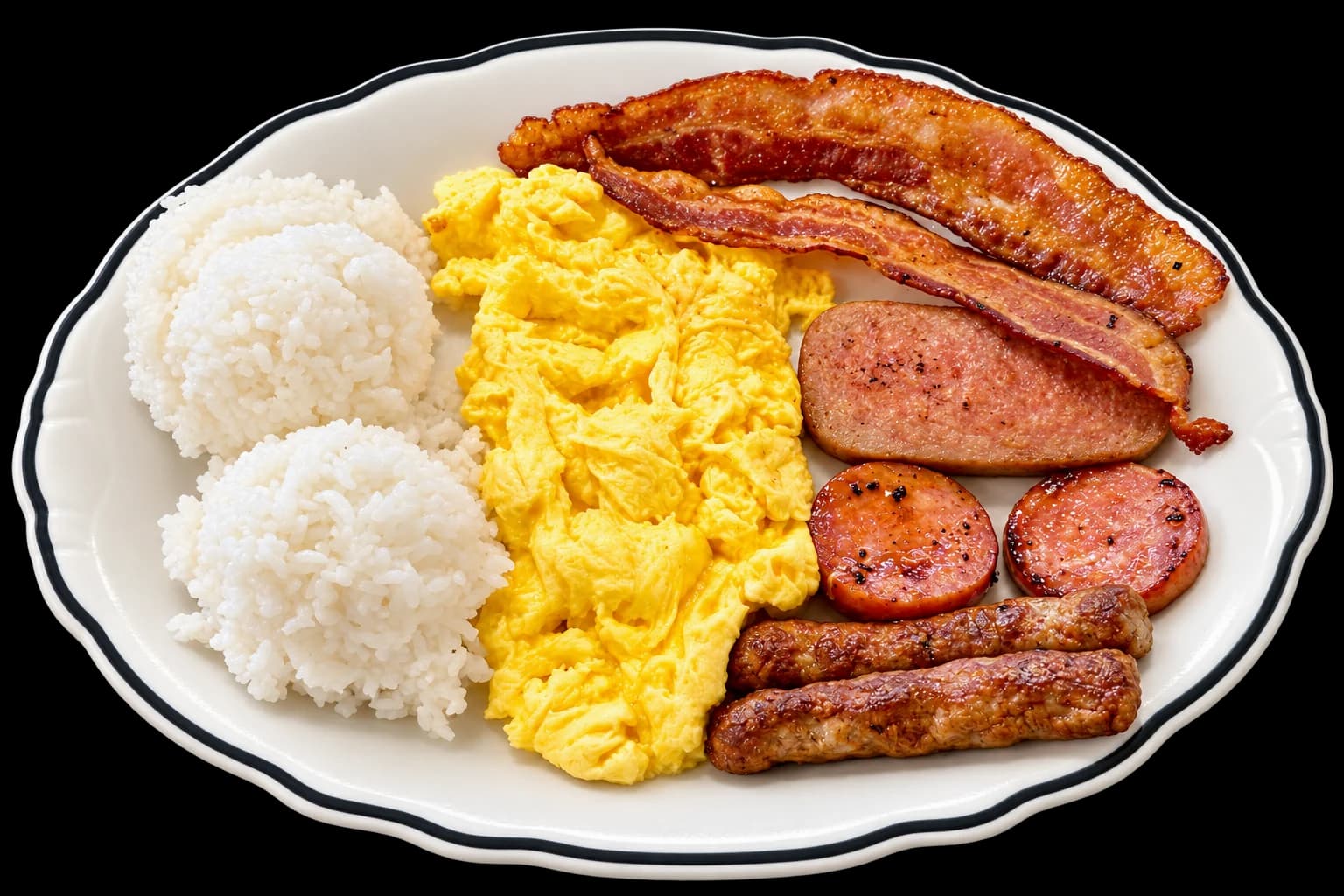 Breakfast meat sampler with eggs, rice, bacon and assorted sausage