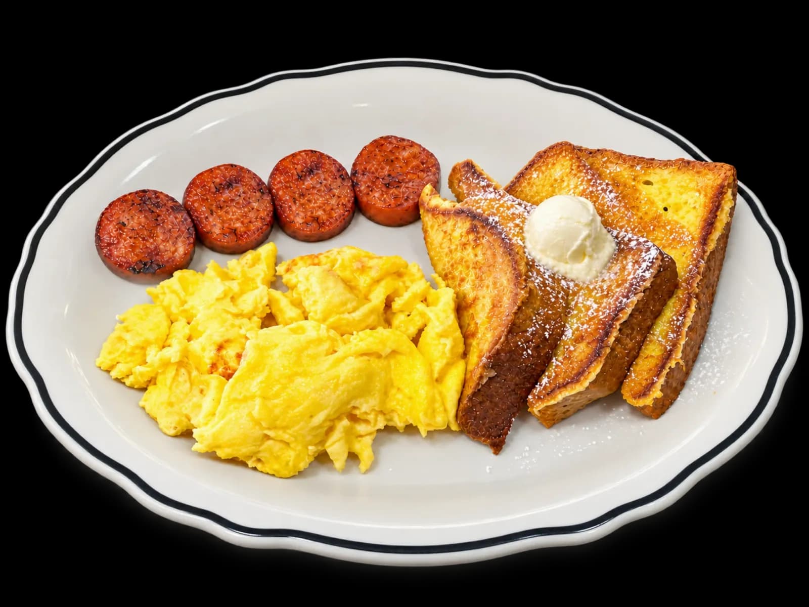 French toast combo with scrambled eggs and four slices of Portuguese sausage