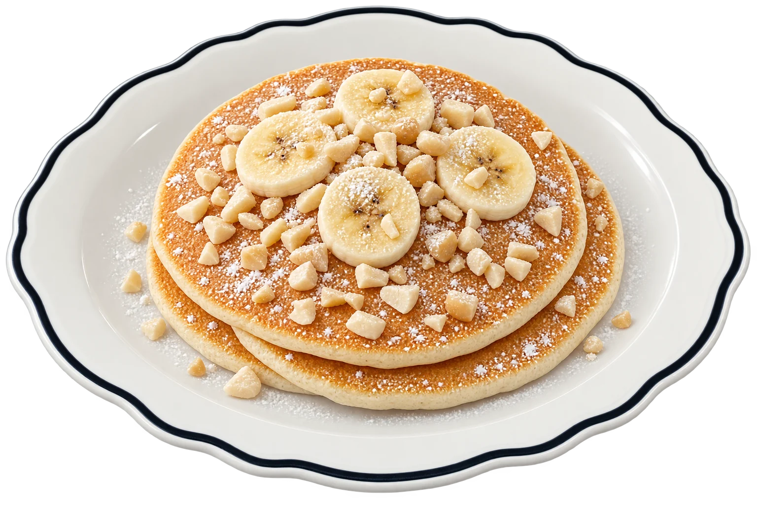 Three stacked pancakes topped with sliced banana, chopped macadamia nuts and powdered sugar